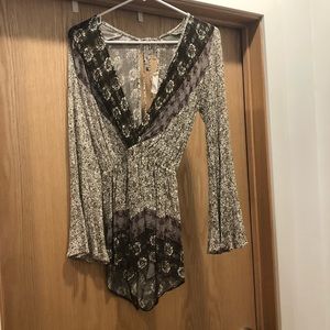 Romper with bell sleeves, size medium